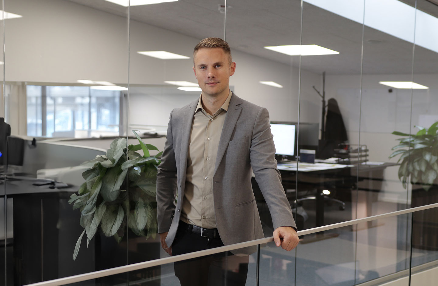 a man standing in an office